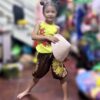 Áo yếm vàng quần bí nâu