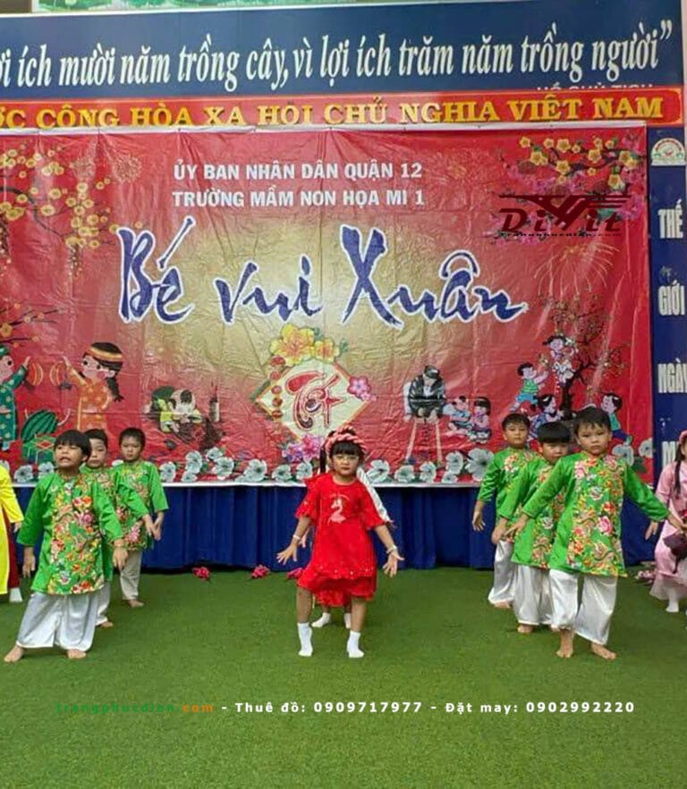 Áo dài xanh lá bé trai